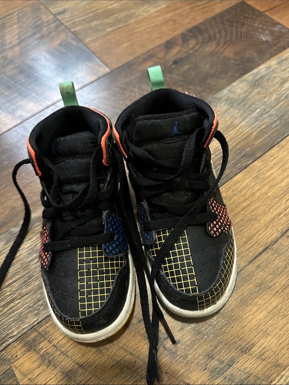 Jordan Kids Black High-Top Sneakers with Yellow Grid and Multicolor Accents